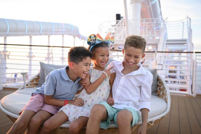 Kids laughing aboard a Disney Cruise Line ship.