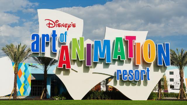 Entrance sign for Disney’s Art of Animation Resort featuring colorful letters, palm trees, and a blue sky